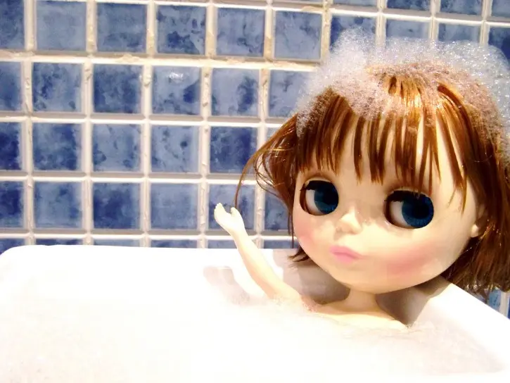 Doll taking a bath