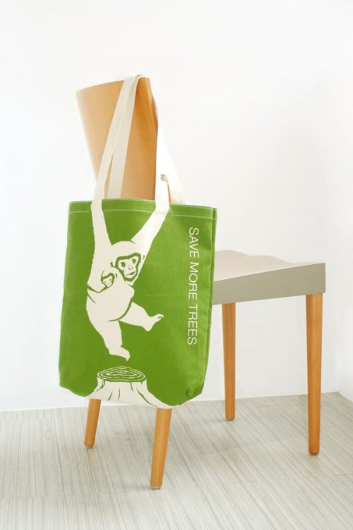 Eco-friendly bag with the image of a monkey with the sign to save more trees 