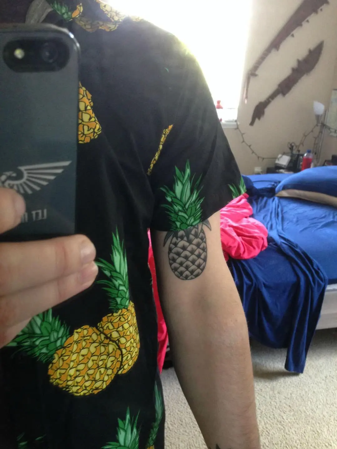 Matching Pineapple Tattoo and Shirt